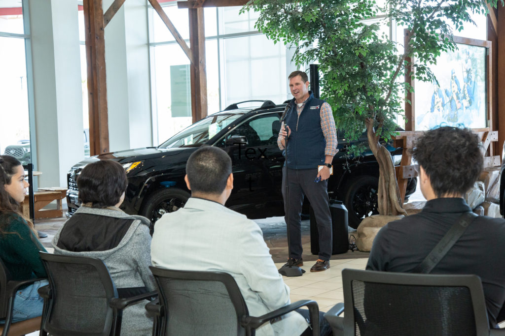 Hiring Our Heroes President Eric Eversole talks to a crowd at a Toyota dealership in Nevada