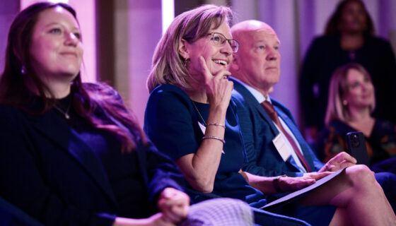 Mollie Raymond listens to a speaker at the 2023 Military Spouse Employment Summit.