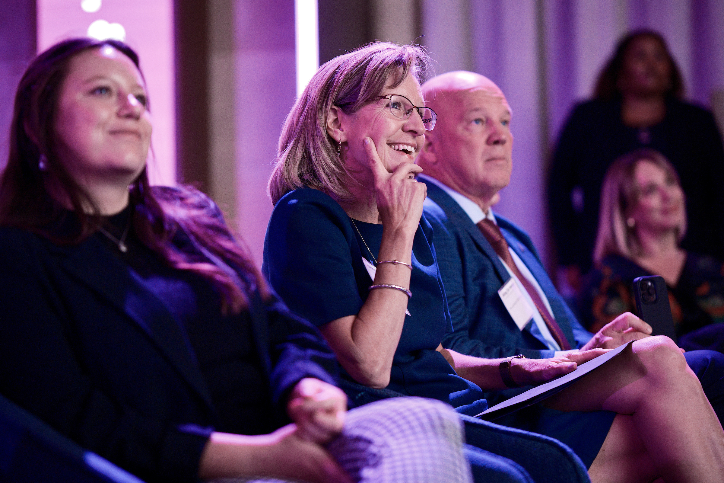 Mollie Raymond listens to a speaker at the 2023 Military Spouse Employment Summit.